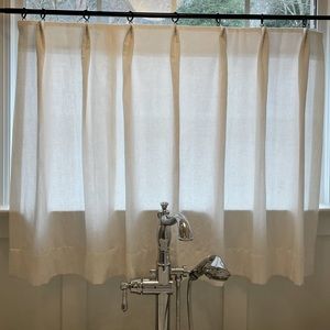 West Elm dark bronze metal curtain rings with thick linen blend cafe curtain.